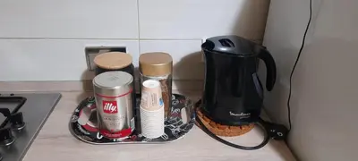 a kitchen counter with a coffee maker and a blender at Kotel rome residenza piazza bologna in Rome