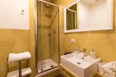 a bathroom with a sink and a shower at A Star Inn in Rome
