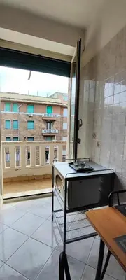 a kitchen with a view of a building at CasAppia in Rome