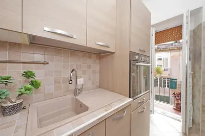 a kitchen with a bath tub and a sink at 4BNB - Ripetta Central Apartment in Rome
