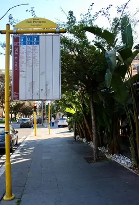 a street sign on the side of a sidewalk at New Green Hill Apartment - Colli Portuensi in Rome