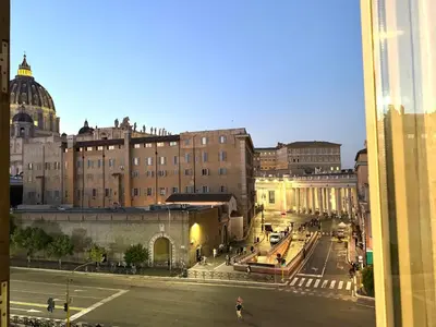 a view of a city with buildings and a street at 3C Domus St Peter Roma Centro 