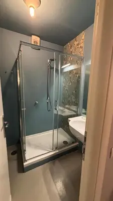 a bathroom with a shower and a sink at La casa di zoe in Rome