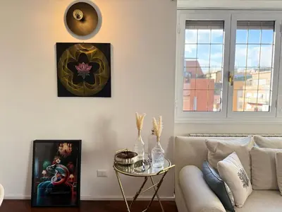 a living room with a couch and a table at CardinalBaldo in Rome