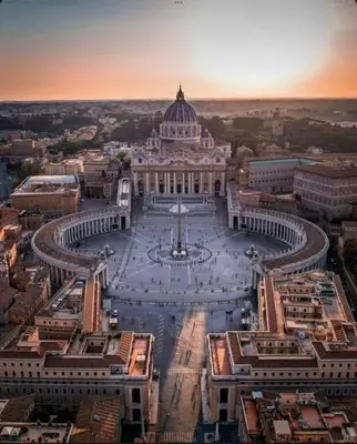 a view of a building with a fountain in front of it at Vatican Exclusive Suite in Rome