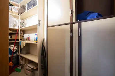 a refrigerator in a kitchen with its door open at Affittacamere Alpino 76 in Rome