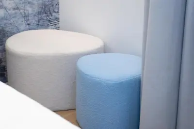 a couple of stools sitting next to each other at ARIOSTO'S Luxury Rooms in Rome