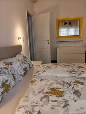 a bedroom with a bed and a window at Gregorio VII Dream House in Rome