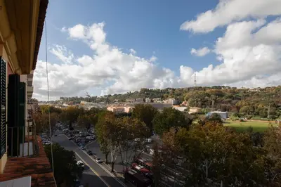 a view of a city street with cars on the road at Tomas' house Clodio in Rome
