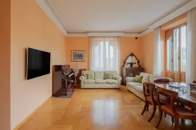 a living room with a couch and a table at Tomas' house Clodio in Rome