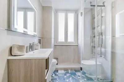 a bathroom with a sink and a toilet and a shower at Biancaapartment in Rome