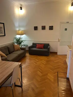 a living room with a couch and a table at loft 06 - new opening in Rome
