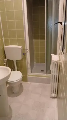 a bathroom with a toilet and a shower at B&B trastevere 2 in Rome