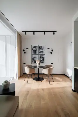 a living room with a table and chairs at San Lorenzo Labicana Luxury Apartment in Rome