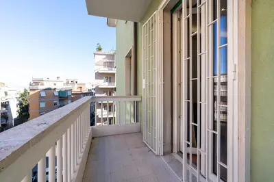 a balcony with a view of a city at Casa Romana Vaticano-Metro in Rome