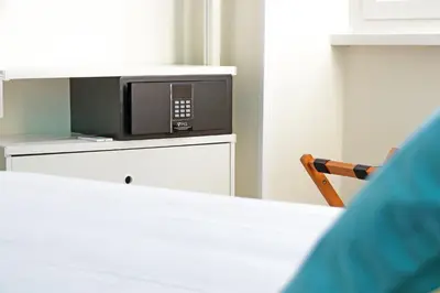 a microwave oven sitting on top of a counter at Domus Augustea - San Giovanni Sunset Suites in Rome