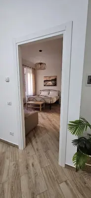 a bedroom with a bed and a couch in a room at La casa di Tilde Roma Angelino in Rome