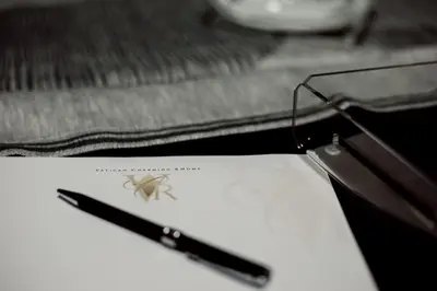 a pair of scissors sitting on top of a table at Vatican Charming RHome in Rome