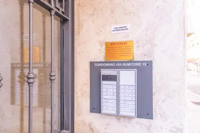 a vending machine on the side of a building at Easy Host Apt Casa Numitore in Rome