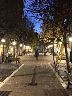 a park at night with benches and street lights at B&B Rome Vatican Residence in Rome