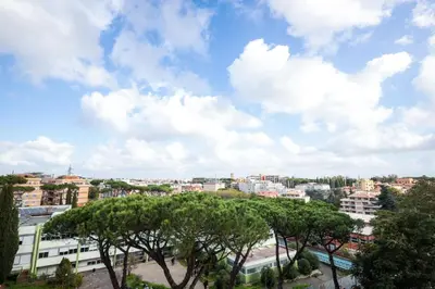 a view of a city with trees and buildings at La Casa di Piero in Rome