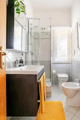 a bathroom with a sink and a toilet at Casa Doria - ROMA in Rome
