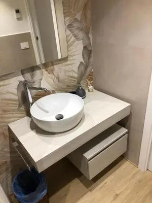 a white sink on a counter in a bathroom at Casa di Corto in Rome