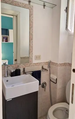 a bathroom with a sink and a toilet at Green House in San Lorenzo Termini in Rome