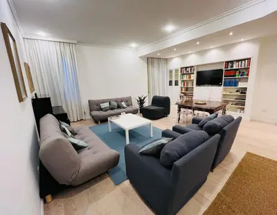 a living room with two couches and a table at GDR Apartment - City Center in Rome