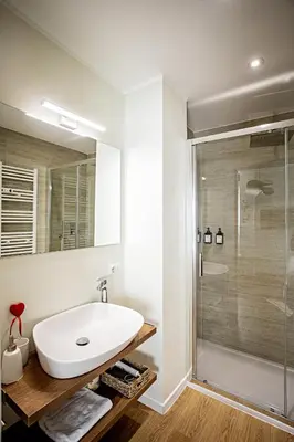 a bathroom with a sink and a shower at Rome suite Rome Vaticano Guest house in Rome
