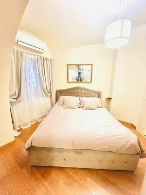a bedroom with a large bed in a room at TritHome in Rome