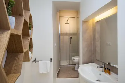 a bathroom with a sink and a toilet at Fabuloucity Fontana di Trevi in Rome