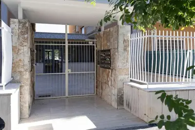 an entrance to a house with a gate at La Dimora del Gianicolo in Rome