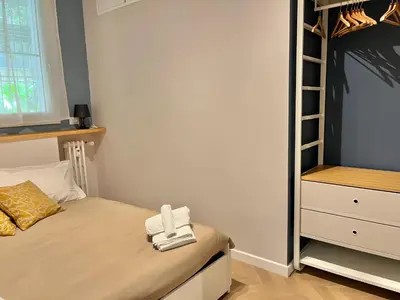 a small bedroom with a bed with towels on it at Gioia di Roma in Rome