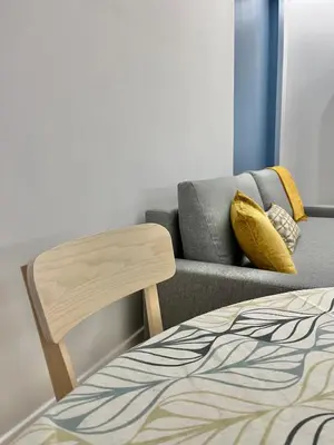 a living room with a couch and a bed at Gioia di Roma in Rome