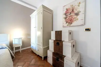 a bedroom with a pile of boxes in a room at Beautiful in Rome