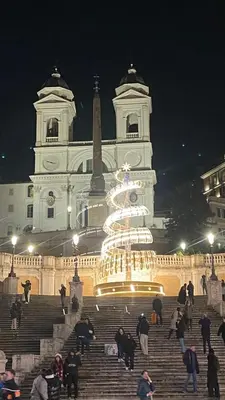 a large building with a christmas tree in front of it at Lady A in Rome- Luxury Apartment in Rome