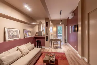 a living room with a couch and a table at OldStation in Rome