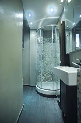 a bathroom with a shower and a sink at Ponte Milvio Cozy 1BR Apartment in Rome