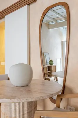 a bedroom with a bed and a table with a plant at Eos Retreat in Trastevere with pool in Rome