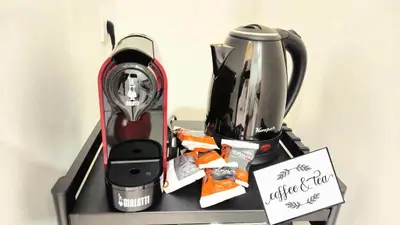 a blender sitting on top of a shelf at Rome Boulevard Suite in Rome