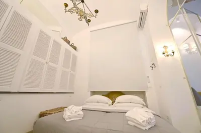 a kitchen with a gold sink in a counter at Romantic Silent Garden in Rome