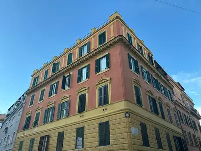 a red brick building with windows on top of it at Loft Trastevere in Rome