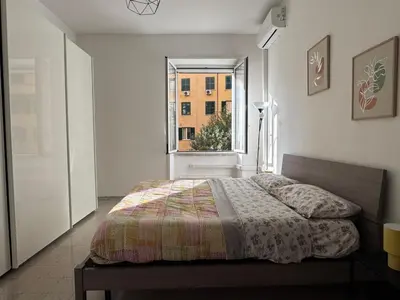 a bedroom with a bed and a window at Metronio Relax in Rome