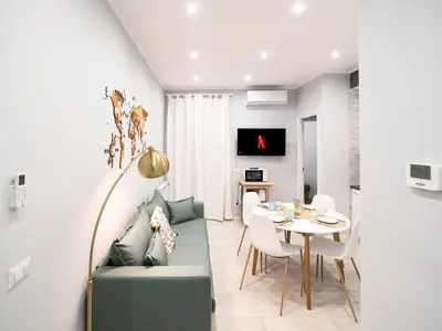 a living room with a couch and a table at Rome Vatican Stay - Appartamento 2 camere da letto vicino al Vaticano in Rome