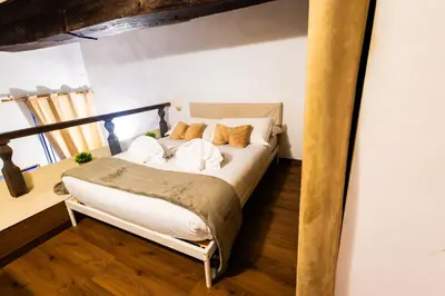 a bedroom with a bed in a room at Domus Pellegrino heart of ROME in Rome