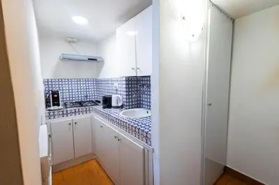 a small bathroom with a sink and a mirror at Domus Pellegrino heart of ROME in Rome