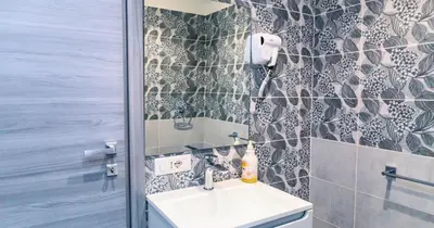 a bathroom with a sink and a toilet at Desideri di Roma - Basilica San Paolo - Ospedale Bambin Gesu'-Roma III - 8th Piano Vicino la Metro in Rome