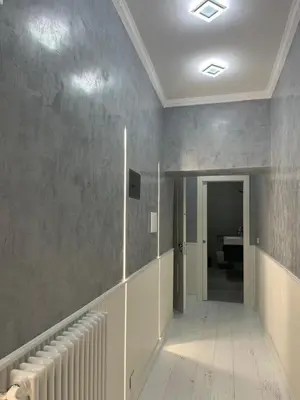 an empty hallway with a radiator in a room at Villafranca17 in Rome