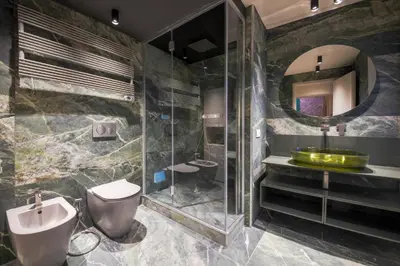 a bathroom with a sink toilet and a mirror at Colonna Collection in Rome